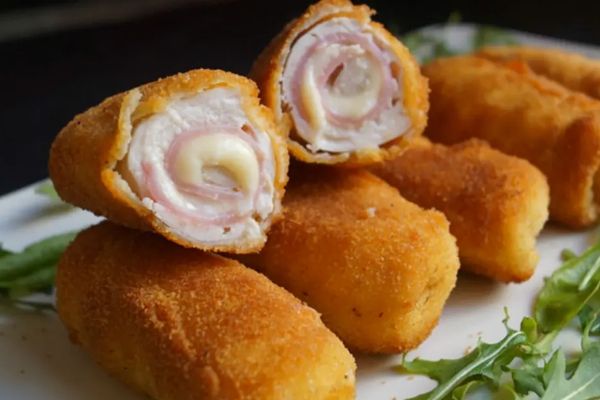 5 Passos para um Delicioso Enroladinho de Queijo com Presunto Caseiro que Vai Encantar seus Sentidos!